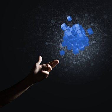 Yeniliğin sembolü olarak insan eli küp figürüne yakın olmak. Karışık ortam.