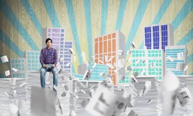 Belgeleri arka plan üzerinde kabataslak cityscape manzaralı uçan arasında casual giyim oturuşta çekici bir adam. Karışık teknik.