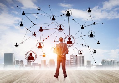 Modern şehir manzarası ve bağlantı konseptine bakan işadamlarının arka planı