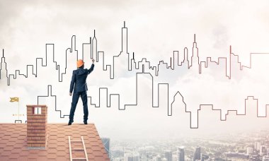 Mühendis, evinin çatısına geri döndü ve şehri çiziyor. Karışık ortam