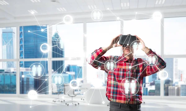 Young Man Virtual Reality Headset Glasses Connection Background Mixed Media — Stock Photo, Image