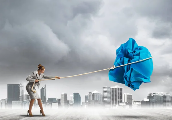 Young Woman Outdoors Making Huge Paper Ball Move — Stock Photo, Image