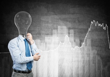 Beton arka planda lamba başlıklı düşünceli iş adamı