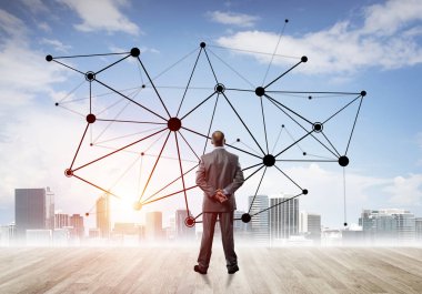 İşadamı arkasını kolluyor ve ağ çizimi kavramına bakıyor