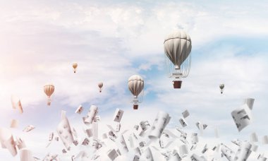 Renkli aerostats kağıt belgeler arasında ve mavi bulutlu gökyüzü üzerinde uçan. 3D render.