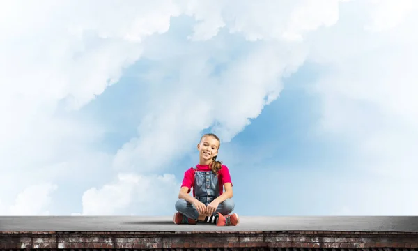 Cute Kid Girl Sitting Building Roof Looking Camera — Stock Photo, Image