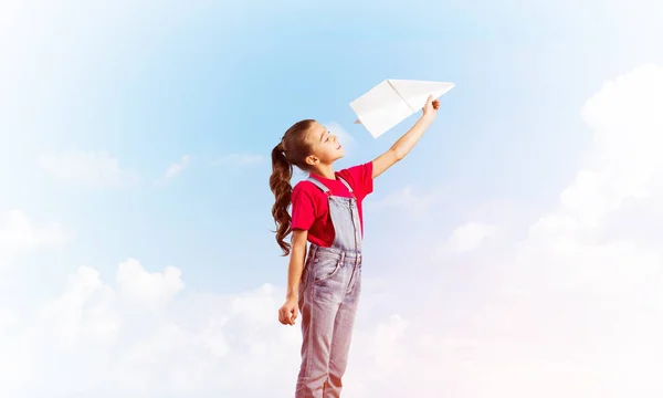 Cute Kid Girl Overalss Paper Plane Hand — Stock Photo, Image