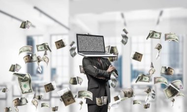 İş başına dolar ofis binası içinde uçan arasında duran geçti silah tutmak yerine dizüstü bilgisayar ile takım elbiseli adamı resim kırpılmış.