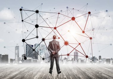 İşadamı arkasını kolluyor ve ağ çizimi kavramına bakıyor