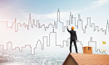 Mühendis, evinin çatısına geri döndü ve şehri çiziyor. Karışık ortam