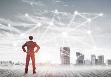 İşadamı arkasını kolluyor ve ağ çizimi kavramına bakıyor