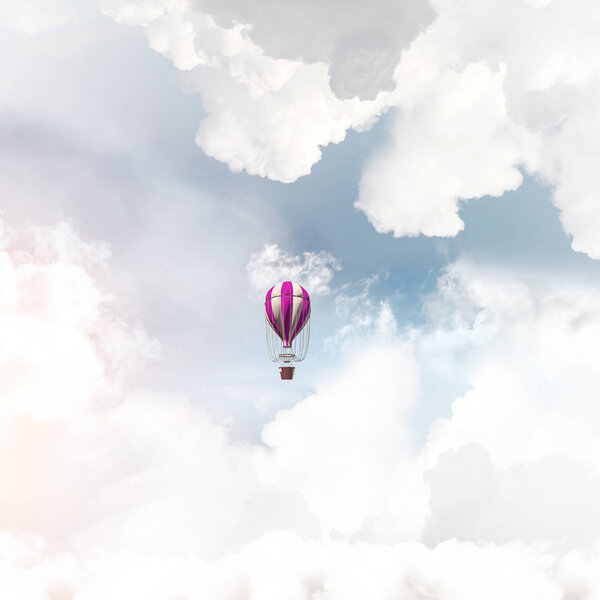 Красочный аэростат пролетает над голубым облачным небом. 3D рендеринг
.