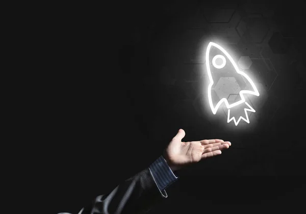 Rocket Glowing Icon Businessman Hand Dark Background — Stock Photo, Image