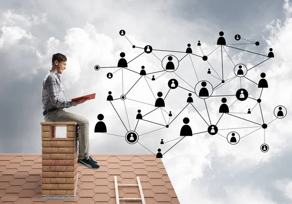 Young Man Casual Sitting House Chimney Red Book Hands — Stock Photo, Image