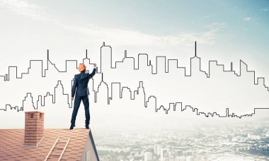 Mühendis, evinin çatısına geri döndü ve şehri çiziyor. Karışık ortam