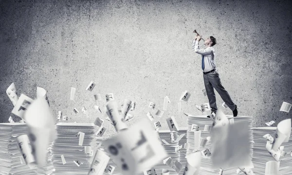 Businessman Playing Fife While Standing Pile Documents Flying Papers Grey — Stock Photo, Image