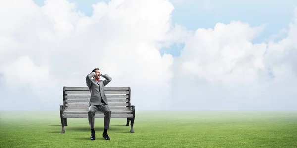 Frustrated Businessman Sitting Bench Closing Ears Hands — Stock Photo, Image