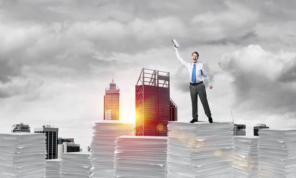 Businessman Keeping Hand Book While Standing Pile Paper Documents Cityscape — Stock Photo, Image