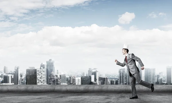 Young Handsome Businessman Wearing White Paper Crown Running Hurry — Stock Photo, Image