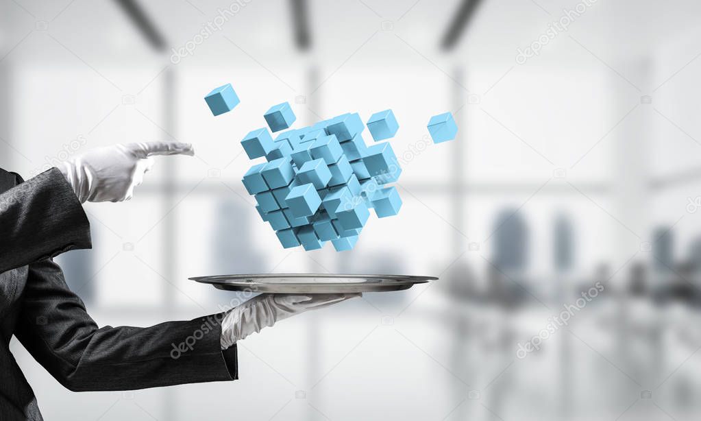 Cropped image of waiter's hand in white glove presenting multiple cubes on metal tray with office view on background. 3D rendering.