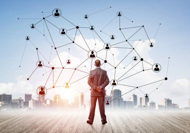 Modern şehir manzarası ve bağlantı konseptine bakan işadamlarının arka planı