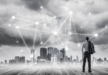 İşadamı arkasını kolluyor ve ağ çizimi kavramına bakıyor