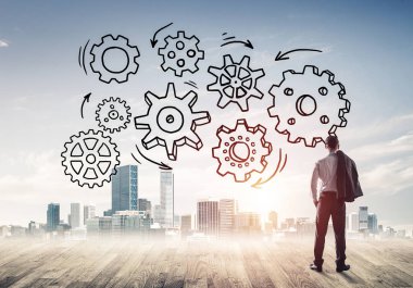 Modern şehre bakan ve vites düzeneği çizen işadamlarının arka planı