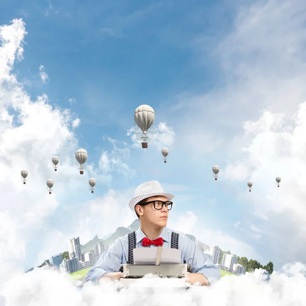 Young Man Writer Hat Eyeglasses Using Typing Machine While Sitting — Stock Photo, Image