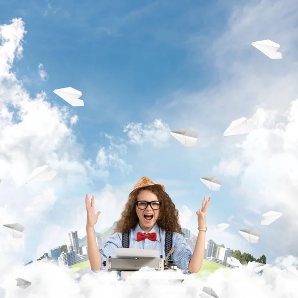 Happy Woman Writer Hat Eyeglasses Using Typing Machine While Sitting — Stock Photo, Image