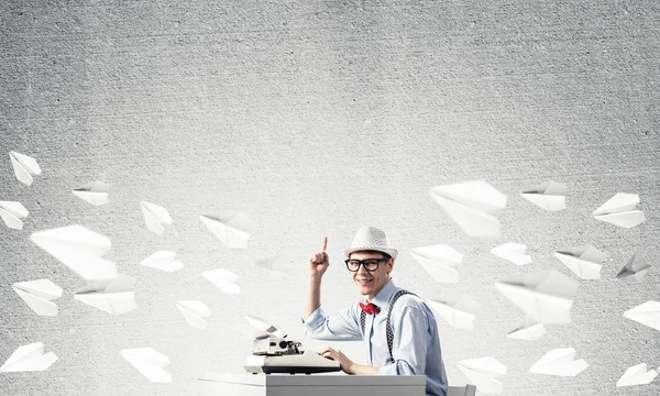 Young Man Writer Hat Eyeglasses Using Typing Machine Pointing Upside — Stock Photo, Image