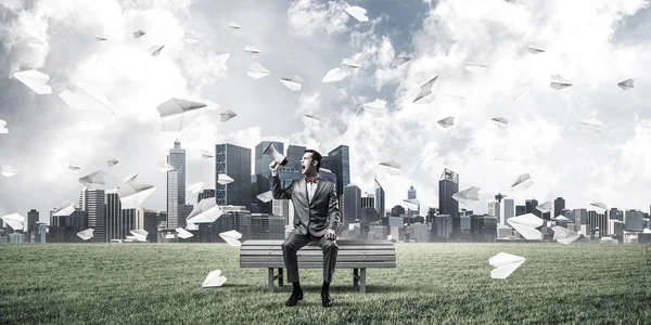 Young Businessman Sitting Bench Screaming Emotionally Megaphone — Stock Photo, Image