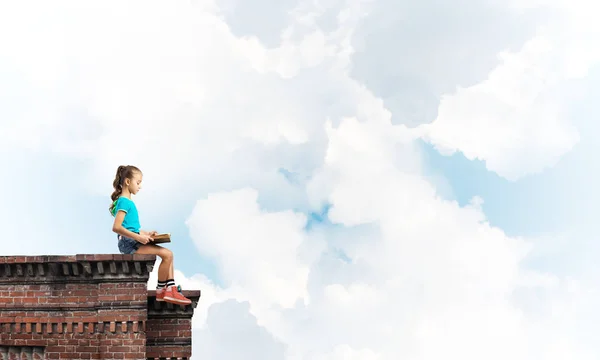 Cute Kid Girl Sitting Building Roof Reading Book — Stock Photo, Image