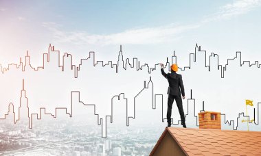 Mühendis, evinin çatısına geri döndü ve şehri çiziyor. Karışık ortam