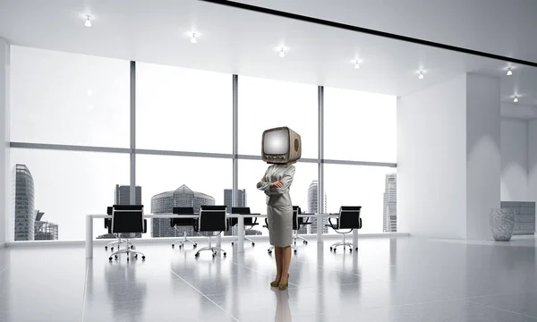 Business woman in suit with an old TV instead of head keeping arms crossed while standing inside office building. 3D rendering.