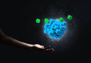 Yeniliğin sembolü olarak insan eli küp figürüne yakın olmak. Karışık ortam.