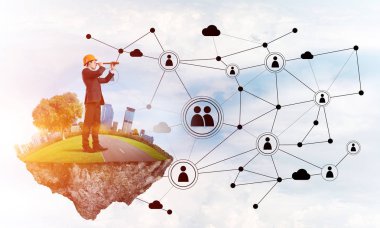 Mavi gökyüzünde yüzen yeşil Adası üzerinde mühendis adam