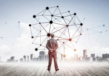 İşadamı arkasını kolluyor ve ağ çizimi kavramına bakıyor