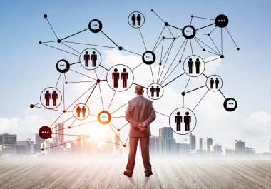 Modern şehir manzarası ve bağlantı konseptine bakan işadamlarının arka planı