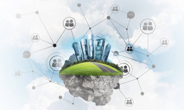 Gökyüzünde yükselen çimen ve şehir manzaralı güzel küçük bir ada.