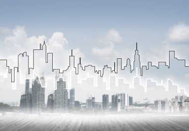 Elle çizilmiş siluet modern şehir manzarasının üzerinde kuleler ve gökdelenlerle