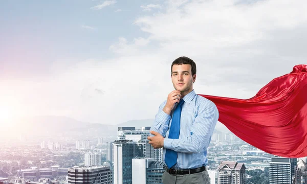 Young Pensive Businessman Wearing Red Cape Modern City Background — Stock Photo, Image