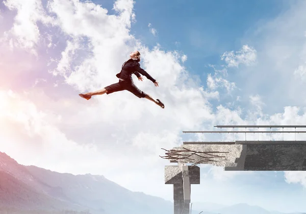 Business woman jumping over huge gap in concrete bridge as symbol of overcoming challenges. Skyscape and nature view on background. 3D rendering.