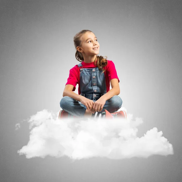 Cute Kid Girl Sitting Cloud Concrete Wall Background — Stock Photo, Image