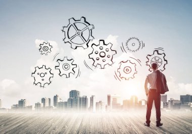 Modern şehre bakan ve vites düzeneği çizen işadamlarının arka planı