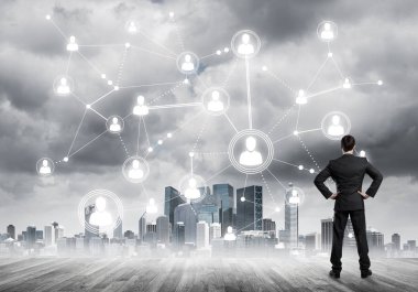 Modern şehir manzarası ve bağlantı konseptine bakan işadamlarının arka planı