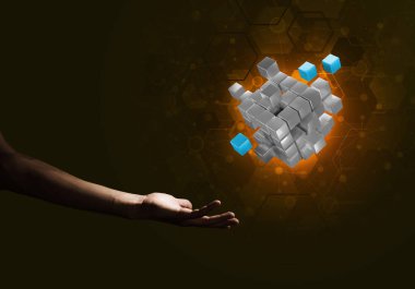 Yeniliğin sembolü olarak insan eli küp figürüne yakın olmak. Karışık ortam.