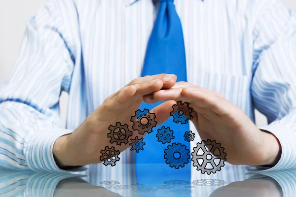 Close Businessman Sitting Table Protecting Gear Mechanism Palms — Stock Photo, Image