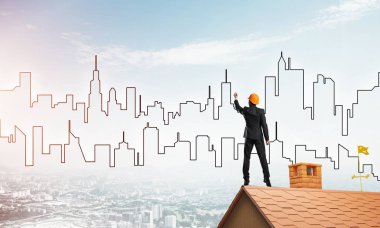 Mühendis, evinin çatısına geri döndü ve şehri çiziyor. Karışık ortam