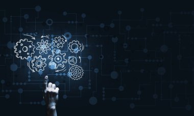 İş adamının eli dişli mekanizmasını işaret ediyor.