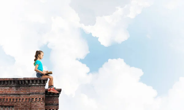 Cute Kid Girl Sitting Building Roof Reading Book — Stock Photo, Image
